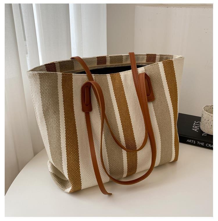 Product Introduction of Túi Vải Bố, Dung Lượng Lớn, Dành Cho Nữ, Túi Tote Thời Trang Người Nổi Tiếng Trên Internet Phổ Biến Mới 2024, Thích Hợp Đi Làm Và Đi Làm, Túi Đeo Vai Lớn 26