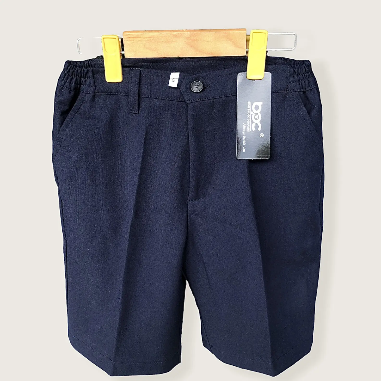 Quần short học sinh tiểu học, vải kaki màu xanh than. Nam