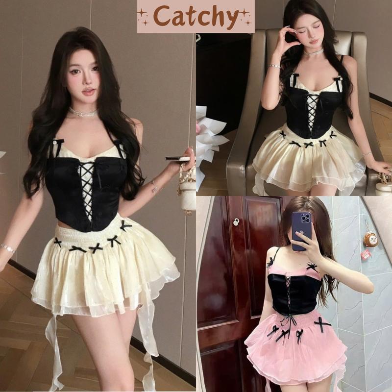 Set Váy Áo Hai Dây Cúp Đan Chéo Phối Chân Váy Chun Cạp Cao Xòe Đính Nơ Sang Chảnh Quyến Rũ -catchystore Set Áo Đính Nơ Đan Dây Chéo Chân Váy Xòe Tầng Tua Rua Đi Tiệc Đi Sự Kiện Nữ Women Top Kem Bo Chun Voi set áo set váy