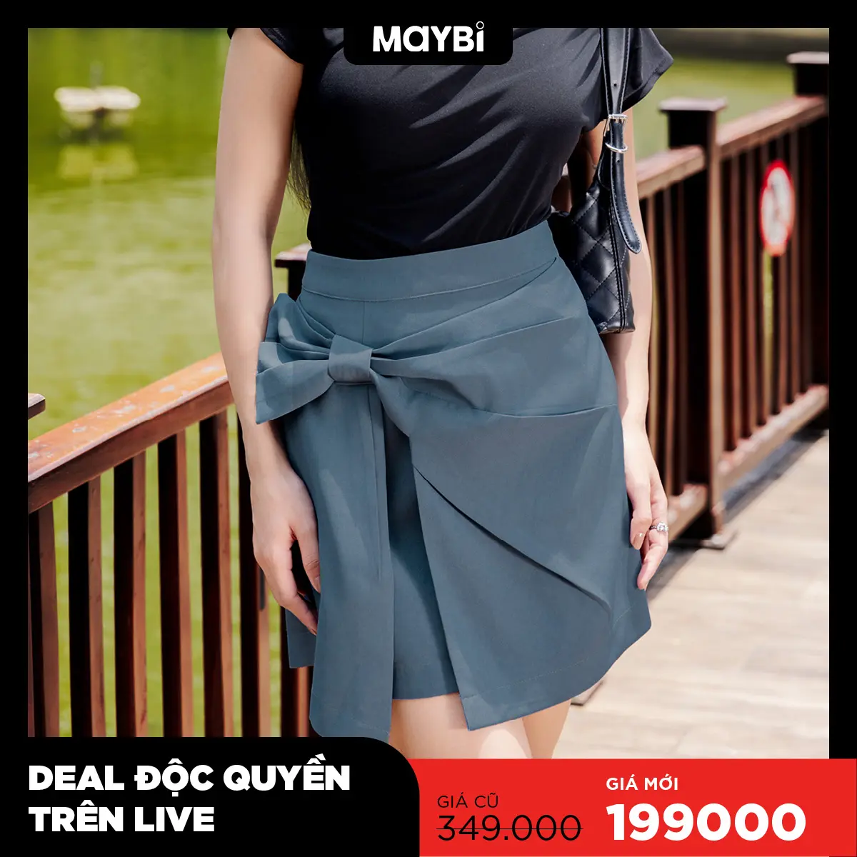 Chân váy mini thắt nơ jean thời trang Maybi Women
