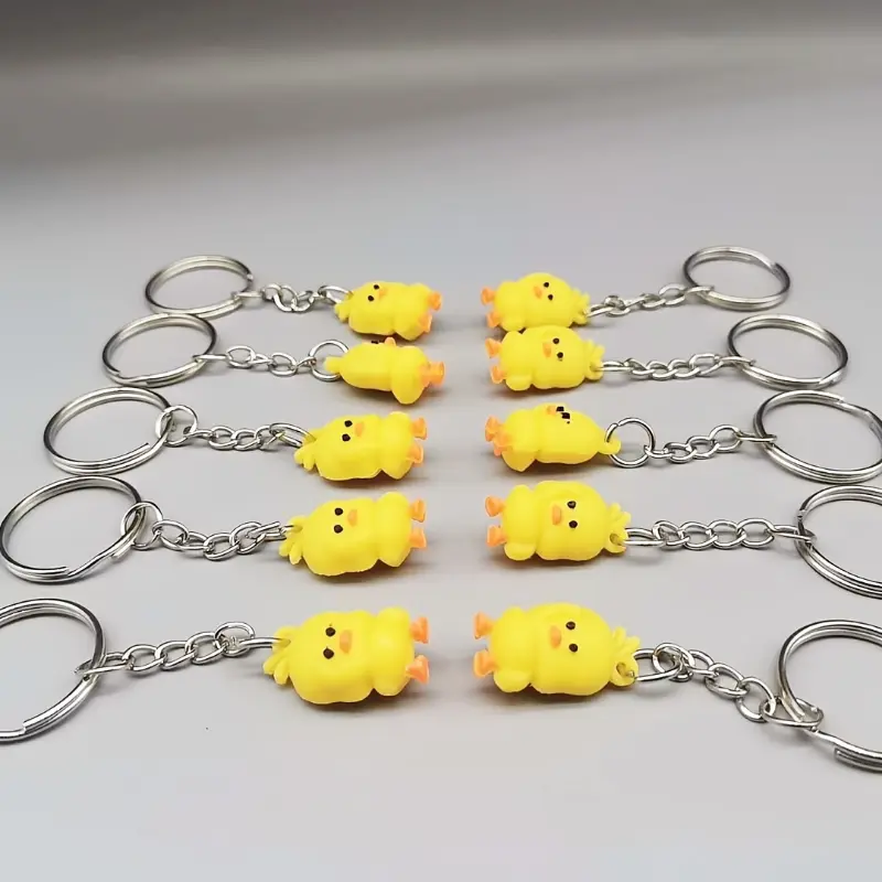 Dancing Yellow Duck Keychain - Creative PVC Doll Charm for Phones & Party Favors 1