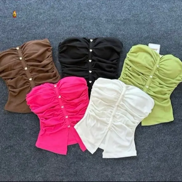 Áo ống nhúm nhúm đính hàng nút xẻ tà giữa cực xinh , chất thun bozip mềm mịn