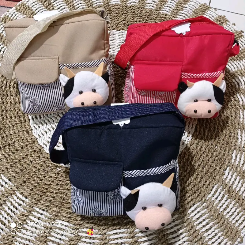 Tas bayi kecil boneka sapi 1