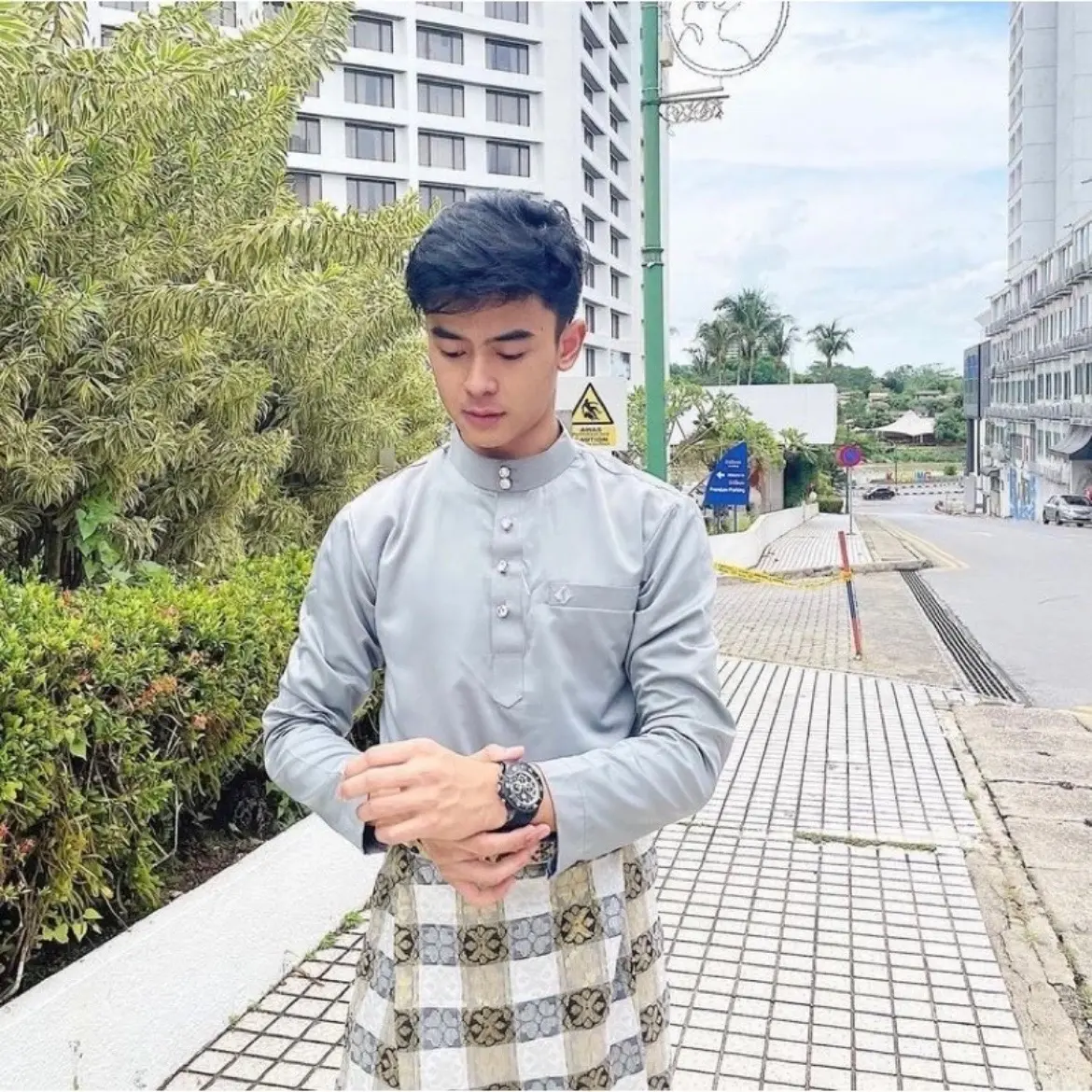 Baju kurung malayu pria Muslim
