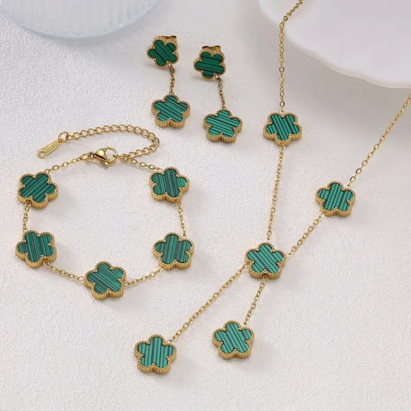 Popular new titanium steel 18k double-sided five-leaf flower bracelet necklace stud earrings three-piece set women's fashion spot wholesale