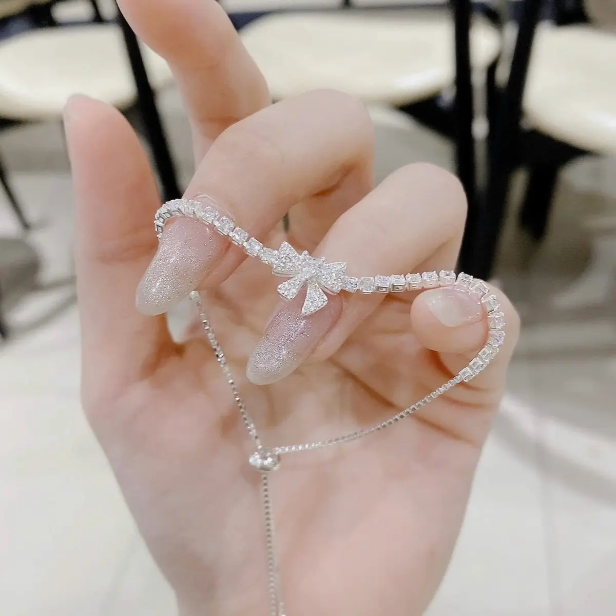 Lắc Tay Bạc Nữ Dây Rút Hình Nơ Tiểu Thư Xinh Xắn