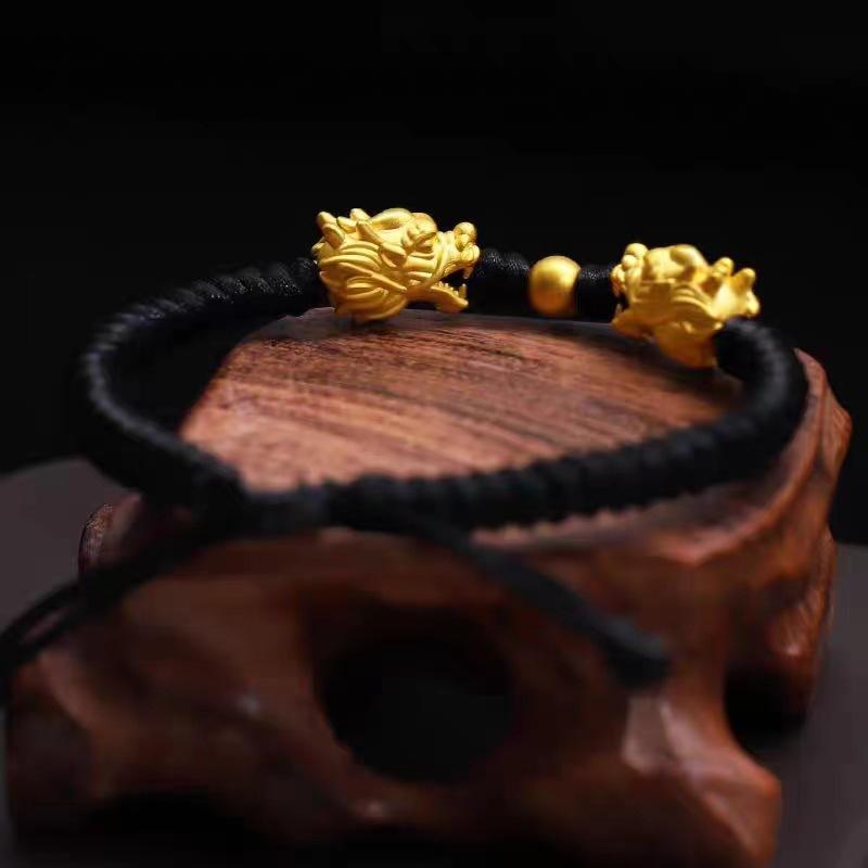 Product Introduction of Boy Meets Girl Bracelet Men's Domineering Zodiac Year Black Rope Woven Bracelet Brass Gold-Plated Faucet Bracelet 9