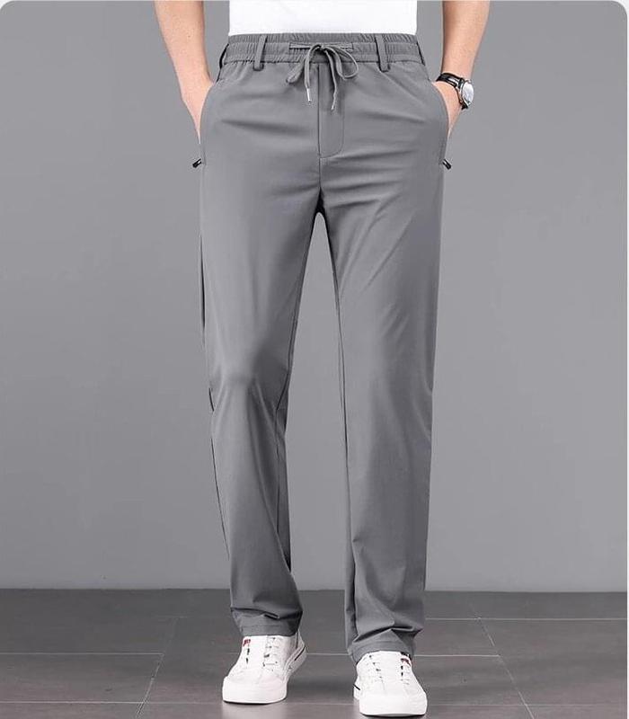 Quần dài Nam vải gió dáng suông Loại Đẹp co dãn 4 chiều dáng suông cạp chun dây rút