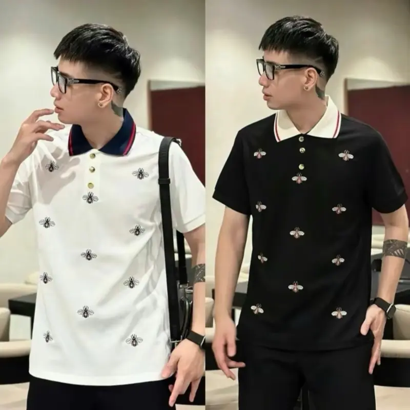 Áo phông PoLo hoạ tiết thêu hình ong , phối đen trắng  chất liệu cottong gai đơn giản  form chuẩn . 0