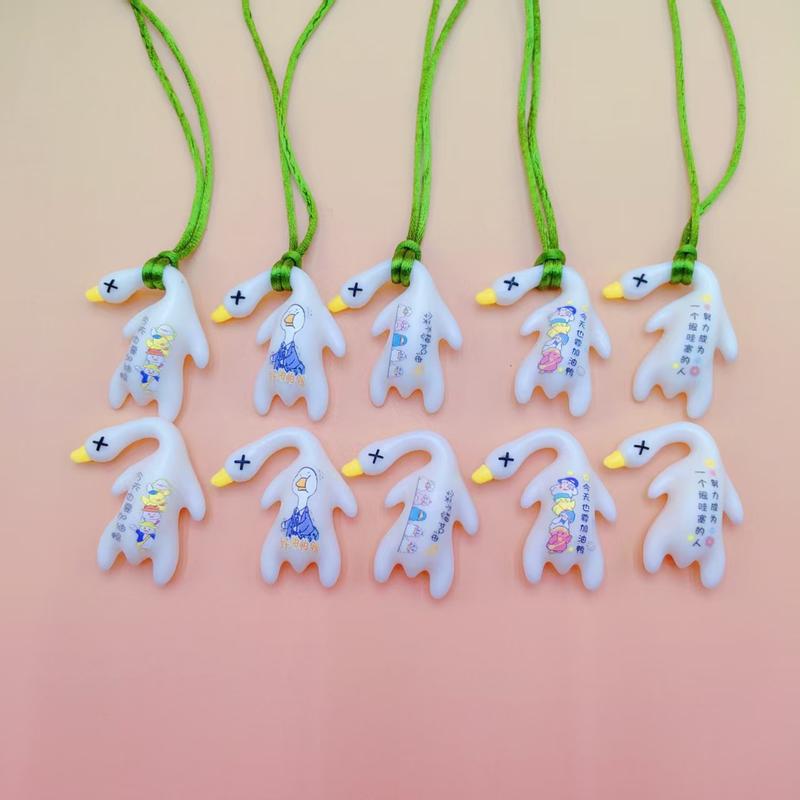 Product Introduction of UV Color Changing Duck Pendant - Creative Duck Decorations for Eco friendly Car Decor Pendants, Keychains, Gifts, and Home Accessories 4
