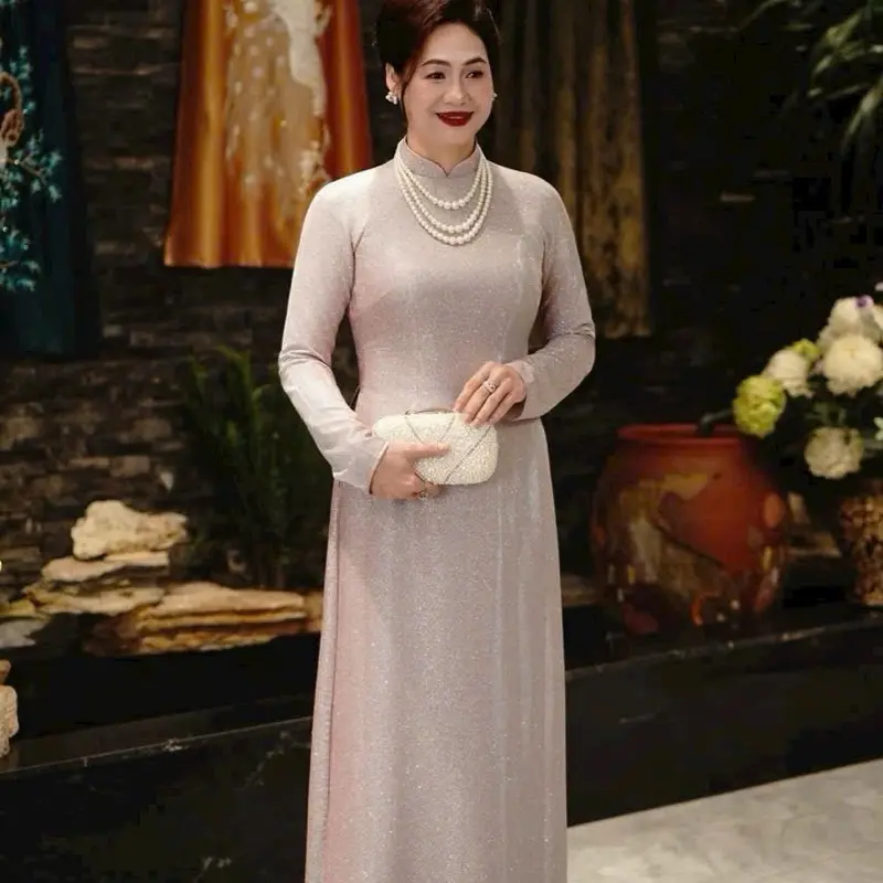 Áo dài nhũ thạch anh kiểu dáng truyền thống, thanh lịch , co dãn nhẹ , đứng from , đủ màu sắc