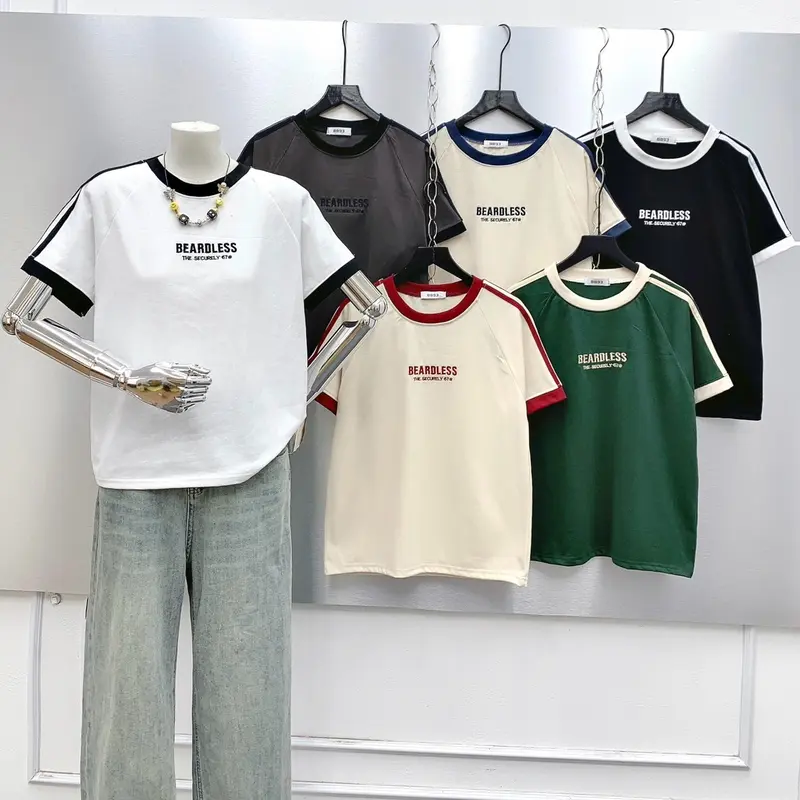 Áo Babytee form vừa 35-55kg Thêu chữ "BEARDLESS" phối sọc Tay Menswear Cổ Tròn 0
