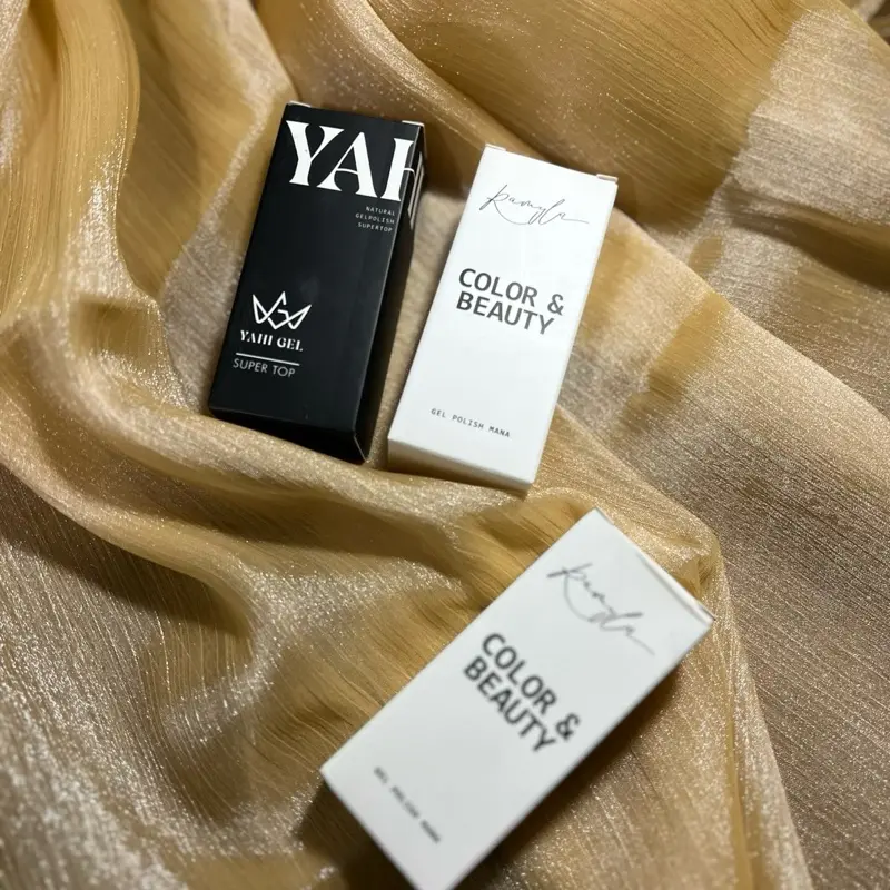 (Cap)  Base top Yahi chĩnh hãng siêu bóng siêu bền( tặng 1 chai sơn ngẫu nhiên) Dòng base top bóng bền, chất gel không quá lỏng cũng không quá đặc, dễ dùng YAHI 1