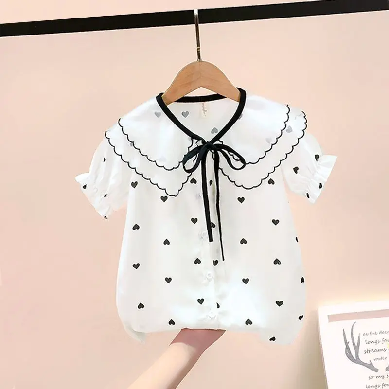 Áo Sơ Mi Cổ Búp Bê Cho Bé Gái, Hàng Mới Về Mùa Hè, ngắn Tay, Phong Cách Phương Tây, Dễ Phối Đồ, Voan Xếp Nhún, Áo Ngọt Ngào Thời Trang, Thích Hợp Cho Trẻ Em Trung Và Lớn