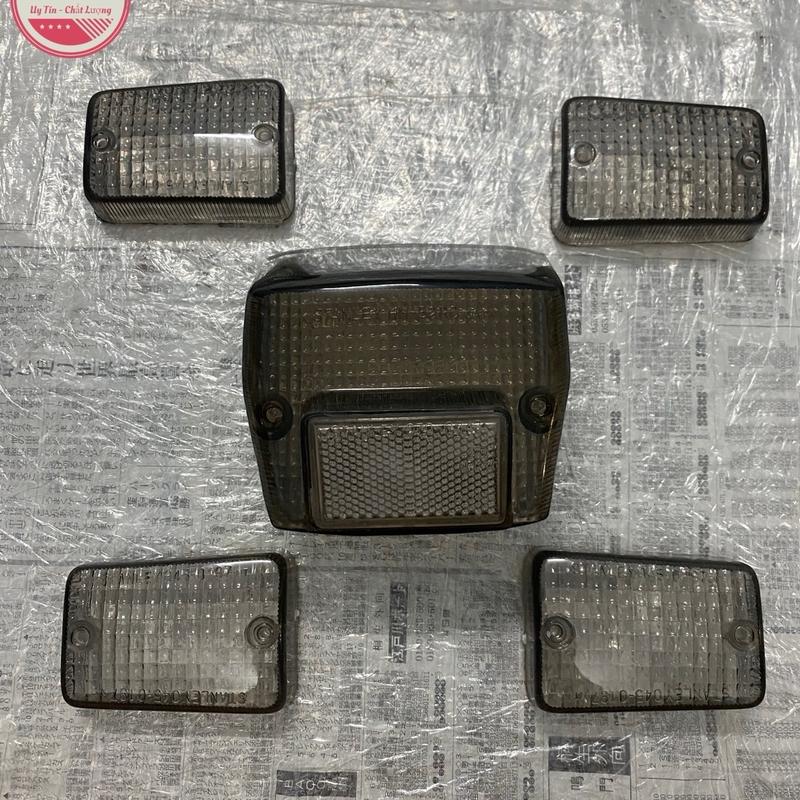 Bộ chụp xi nhan và đèn hậu xe cub 82-84-Dd màu khói