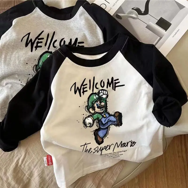 Áo thun cotton dài tay cho trẻ sơ sinh mùa xuân và mùa thu mới cho bé trai và bé gái áo thun hoạt hình tay raglan áo lớp cơ bản trẻ em