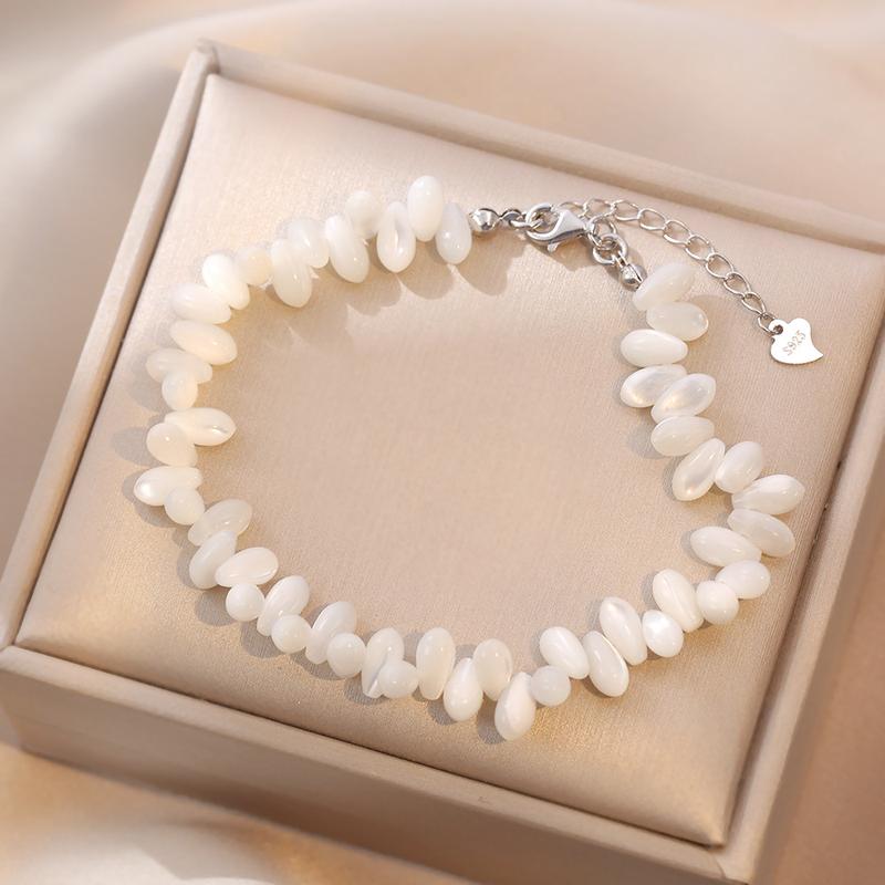 Product Introduction of S925 Silver Natural Rice Grain Shell Necklace Female Irregular Scattered Stitching Shell Niche Personality European and American Clavicle Chain 3