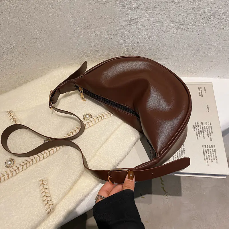 Dumplings bag 2024 New French style bag under the arm women Messenger office staff casual single-channel simple small bag retro wild small bag female bag autumn wild shoulder bag fashion high-end dumplings shoulder bag single