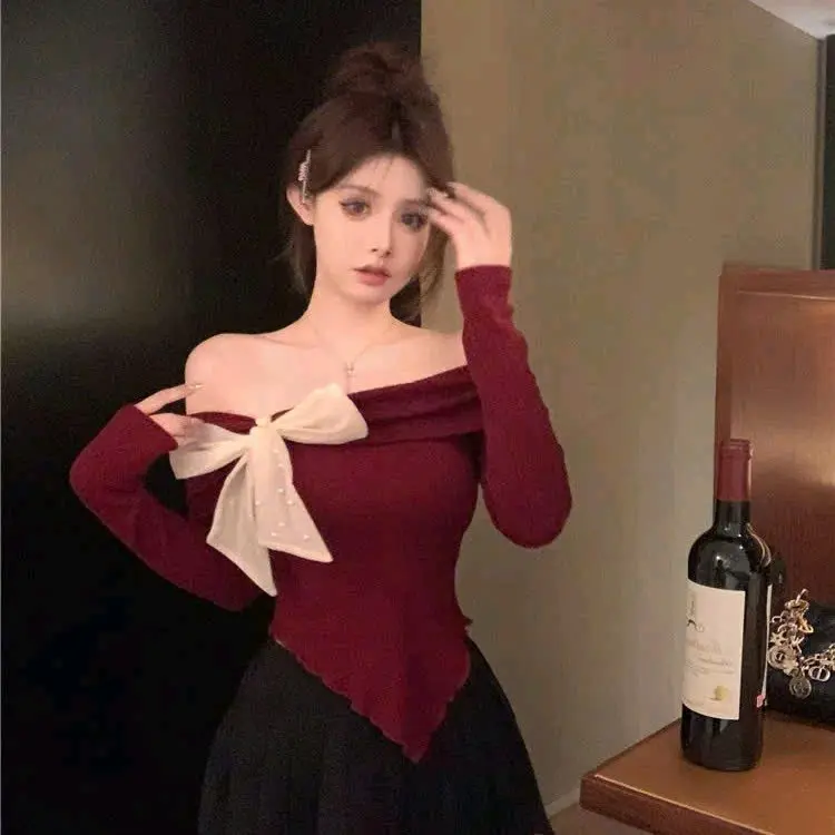 Áo kiểu trễ vai tay dài vạt nhóm buộc nơ đáng ôm body thời trang sang chảnh A028