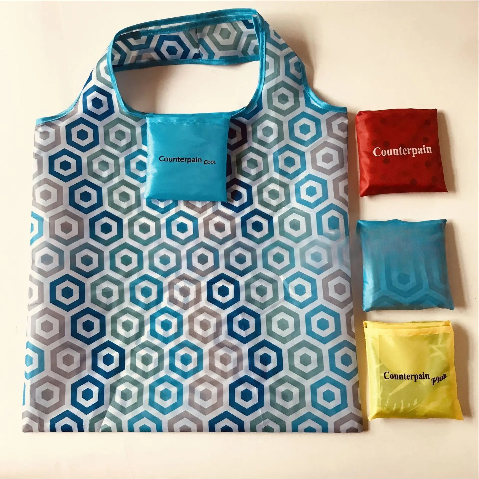 Polyester flower cloth square bag folding bag, fashionable portable shopping bag, storage square advertising environmental protection bag folding