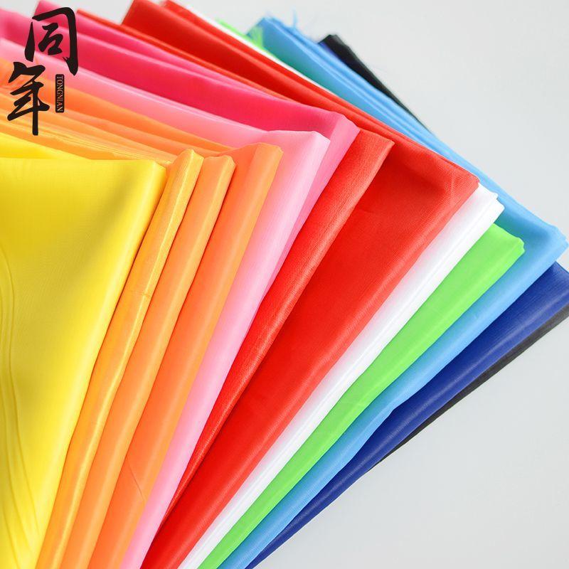 Product Introduction of Tonian big red silk fabric wedding celebration cut color big red flower fabric 190T polyester taffeta colorful flag fabric 23