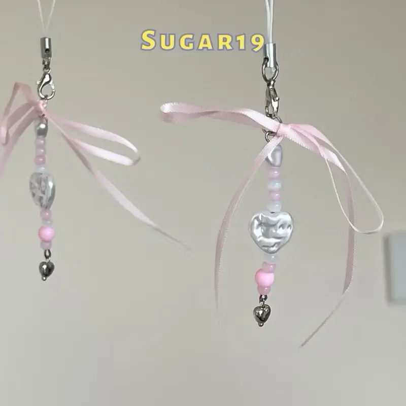 Móc khoá ruy băng tim hồng Sugar19
