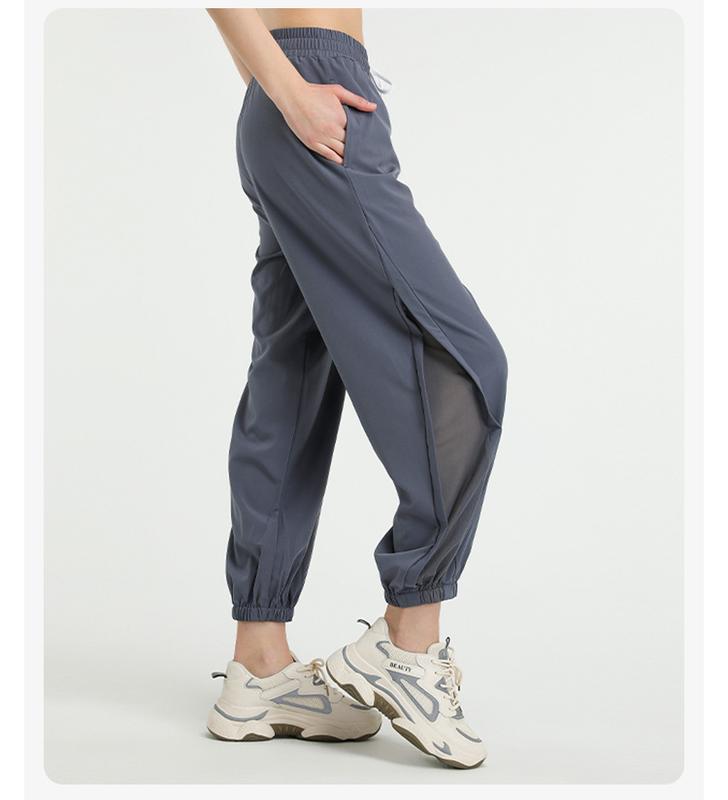 Product Introduction of Loose high-waisted quick-drying pants European and American mesh quick-drying yoga trousers running sports tied feet large-size fitness pants women 11