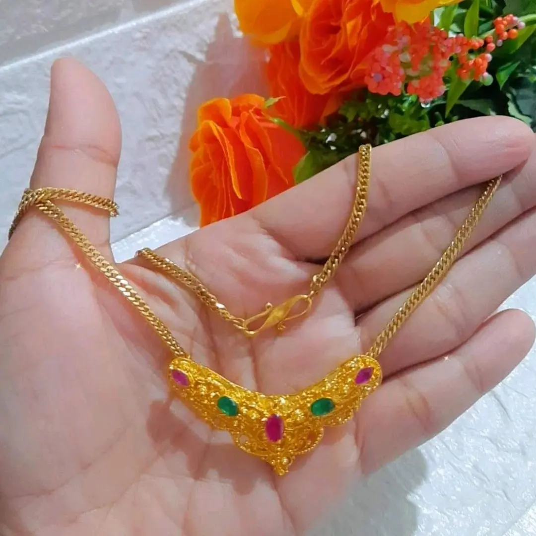 kalung Minang titanium