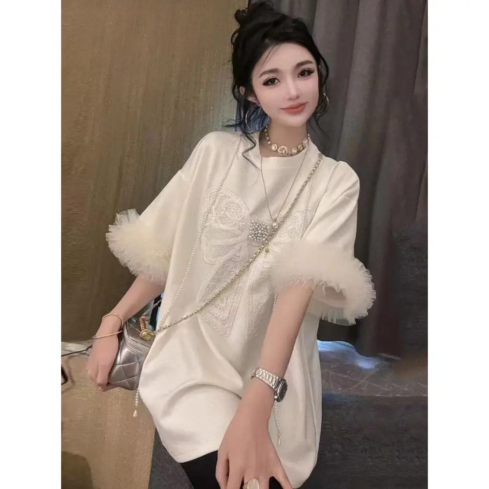 Áo Ngoại Cỡ Hợp Xu hướng Mùa Hè Mới, Dệt Kim, Có Nơ Và Dây Chuyền Đính Cườm, Lưới Chất Lượng Cao, Dáng Rộng Rãi Và Dễ Phối Đồ, Áo Thun ngắn Tay Cho Nữ