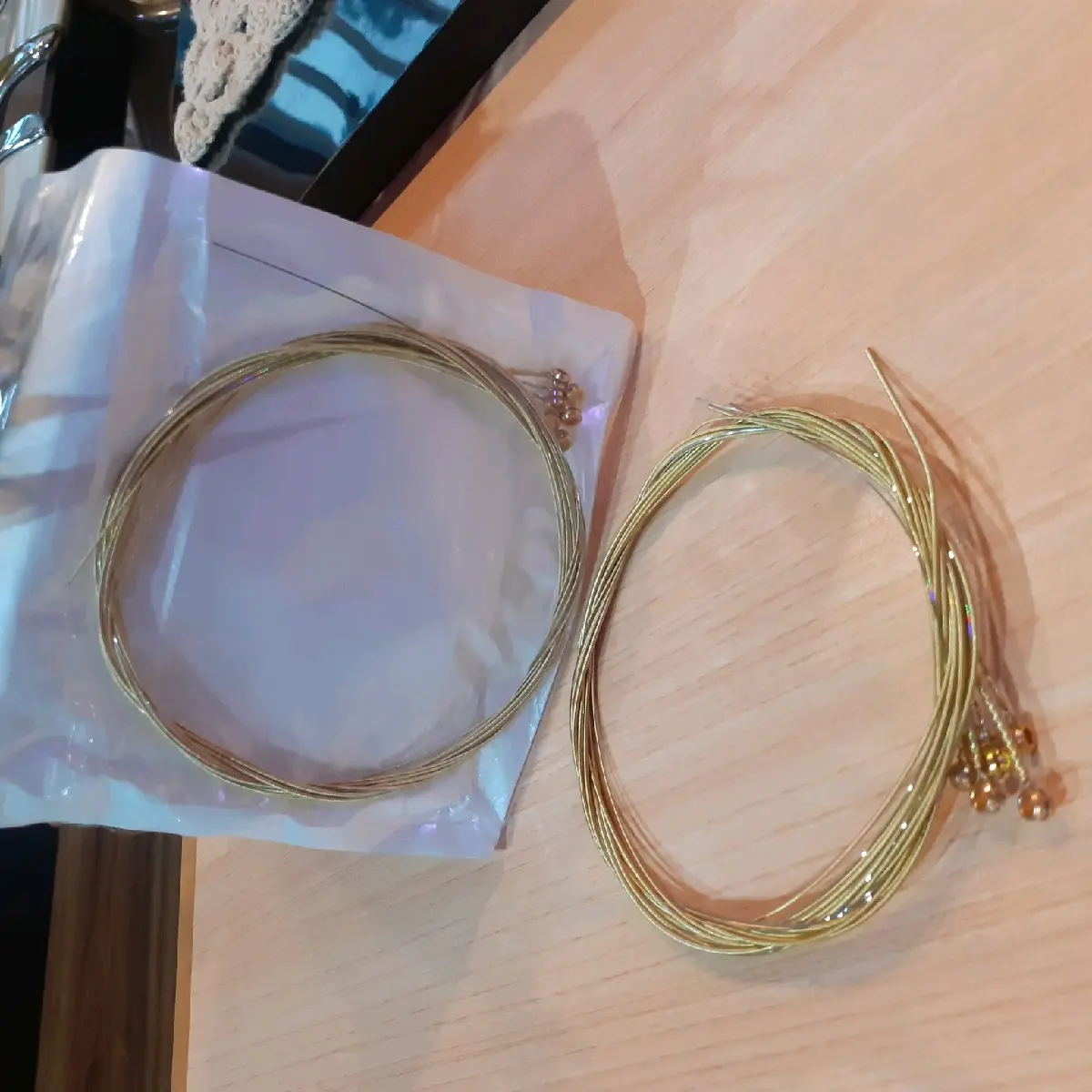 Senar gitar akustik String unpek merek ELIXIR 0.10 warna emas 1 set berkualitas.