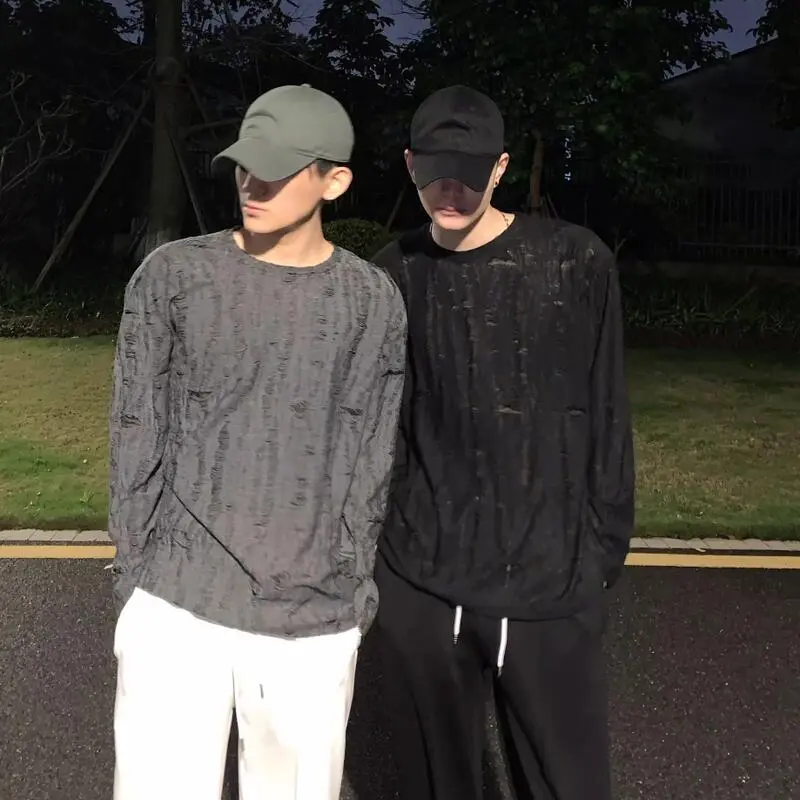 เสื้อยืดลำลองผู้ชาย ผ้าคุณภาพ ระดับไฮเอนด์ อินเทรนด์ ดีไซน์เจาะรู ทรงหลวม สไตล์อเมริกัน คอกลม เสื้อแขนยาว เสื้อสวมหัว สไตล์ไฮสตรีท