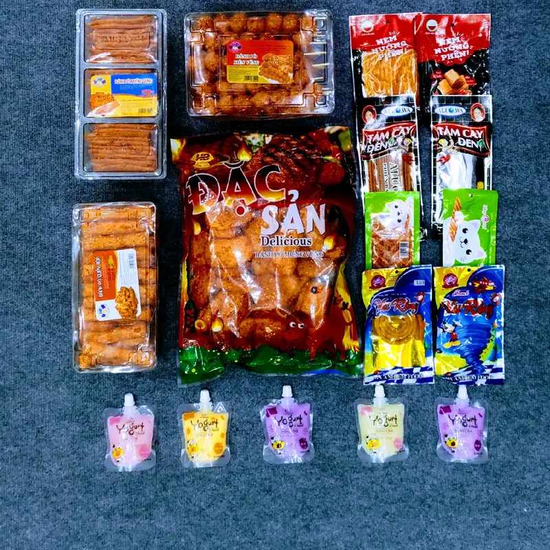 Combo đồ ăn vặt 4 món Snack Bánh Bò kèm Snack nem nướng phên, snack tăm cay đen, snack vòi rồng và 5 sữa chua uống 0