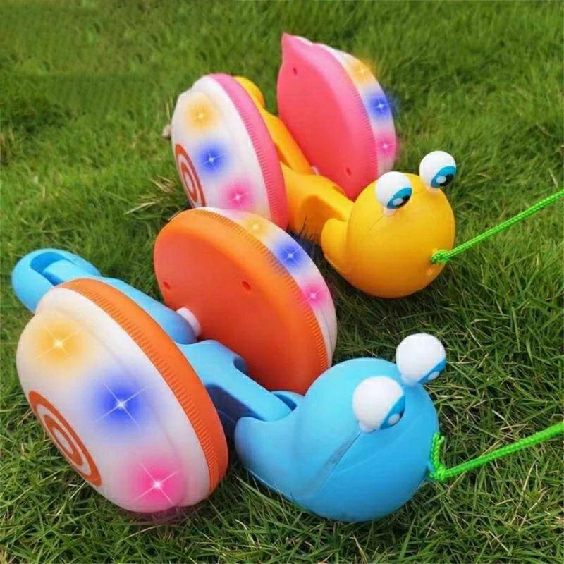 BISA COD!! PROMO MAINAN ANAK SIPUT TARIK GOYANG JALAN MUSIK LAMPU/MAINAN VIRAL SIPUT GOYANG TARIK JALAN 6