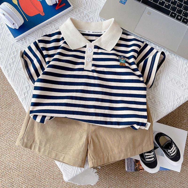 (HÀNG QCCC) Bộ quần áo polo QC thêu hình chó cứu hộ kẻ xanh than áo vải cotton có co giãn mềm kèm quần thô kaki mỏng cho bé đi học đi chơi size 9-20kg