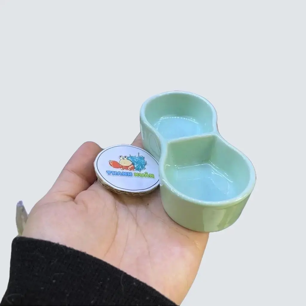 Bát sứ 2 ngăn nhỏ màu xanh và màu cam cho ốc mượn hồn hoặc cho thú cưng khác đựng thức ăn hoặc nước