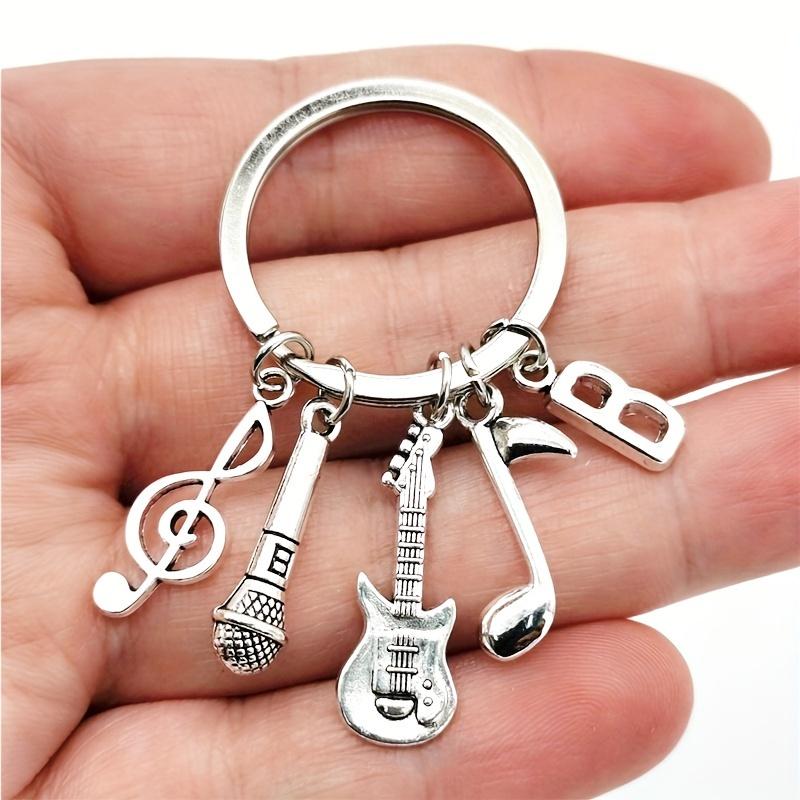 Product Introduction of 1 Piece Creative Fashion A-Z Letter Music Keychain, with Musical Notes, Microphone, and Guitar Pendant - Creative Jewelry - Ideal Decoration for Your Keys and Bags! 1