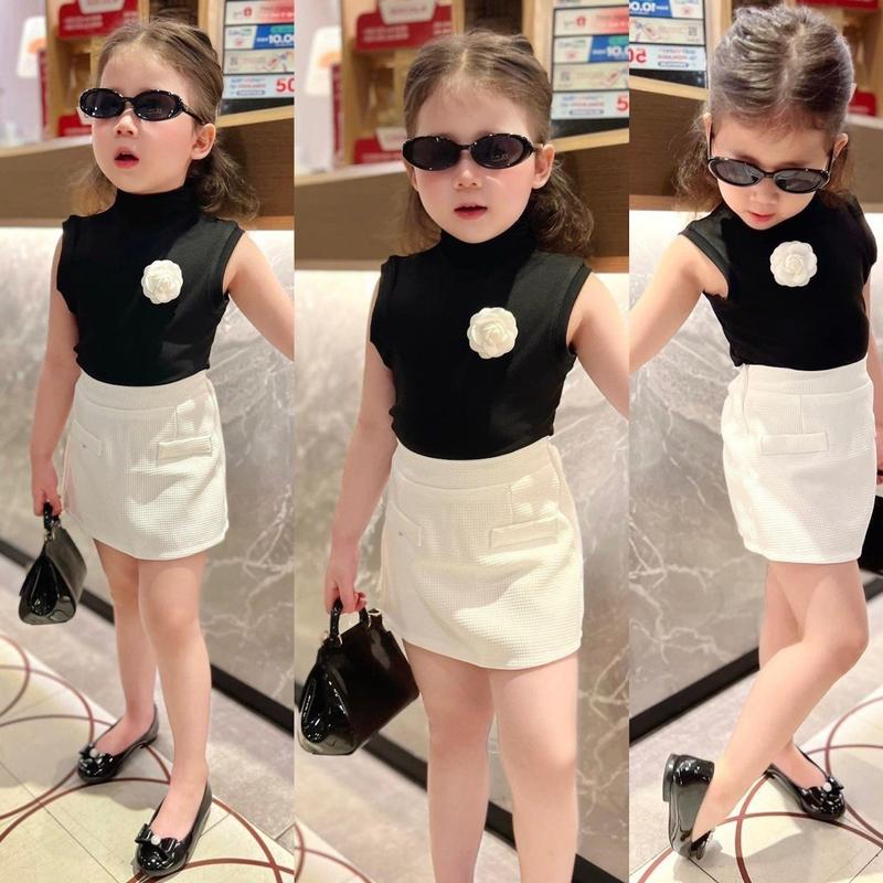 Set áo đen hoa trà + chân váy trắng cho bé gái (9-28kg)