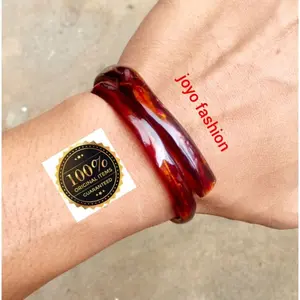 GELANG AKAR BAHAR MERAH KRISTAL TEMBUS CAHAYA