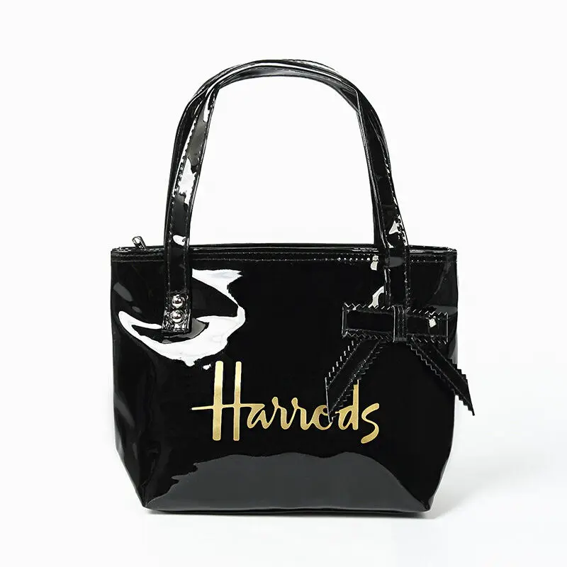 2024 New PVC Fashion British Letters Large Capacity Environmental Protection Shopping Bag Bow Waterproof Handbag Women's Bag