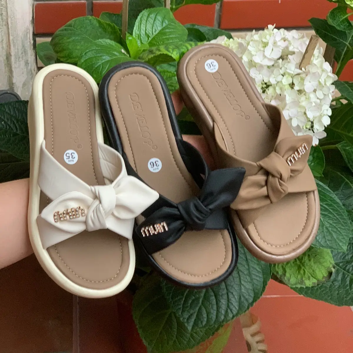 Dép sandanl nữ gắn nơ mác đế nhẹ da mềm(chân gày mỏng lùi size) DéP Sandal