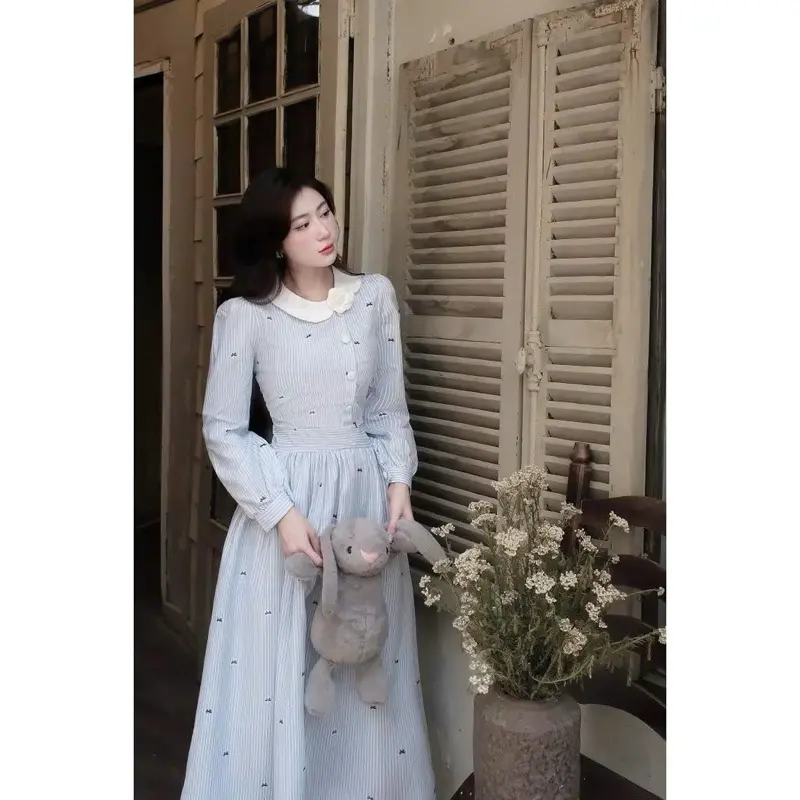 Sét bộ váy kẻ dài xòe cúc bọc nữ tính - Bông Xinhne