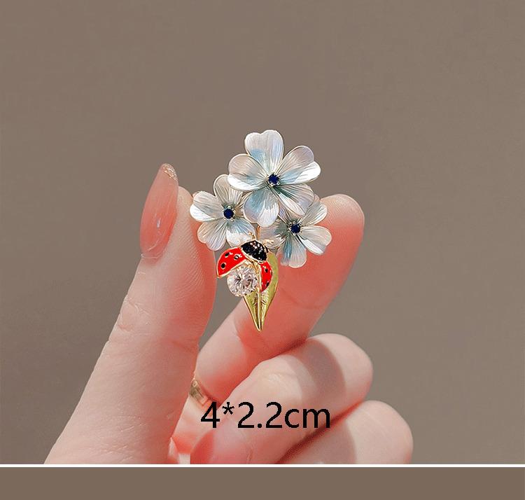 Product Introduction of Flower pearl studded diamond brooch anti glare buckle brooch chest flower small brooch 16