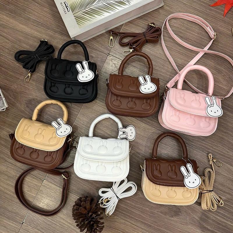 Túi mini đeo chéo cầm tay gắn thỏ dễ thương Bag Nữ Da Nhung Hoa