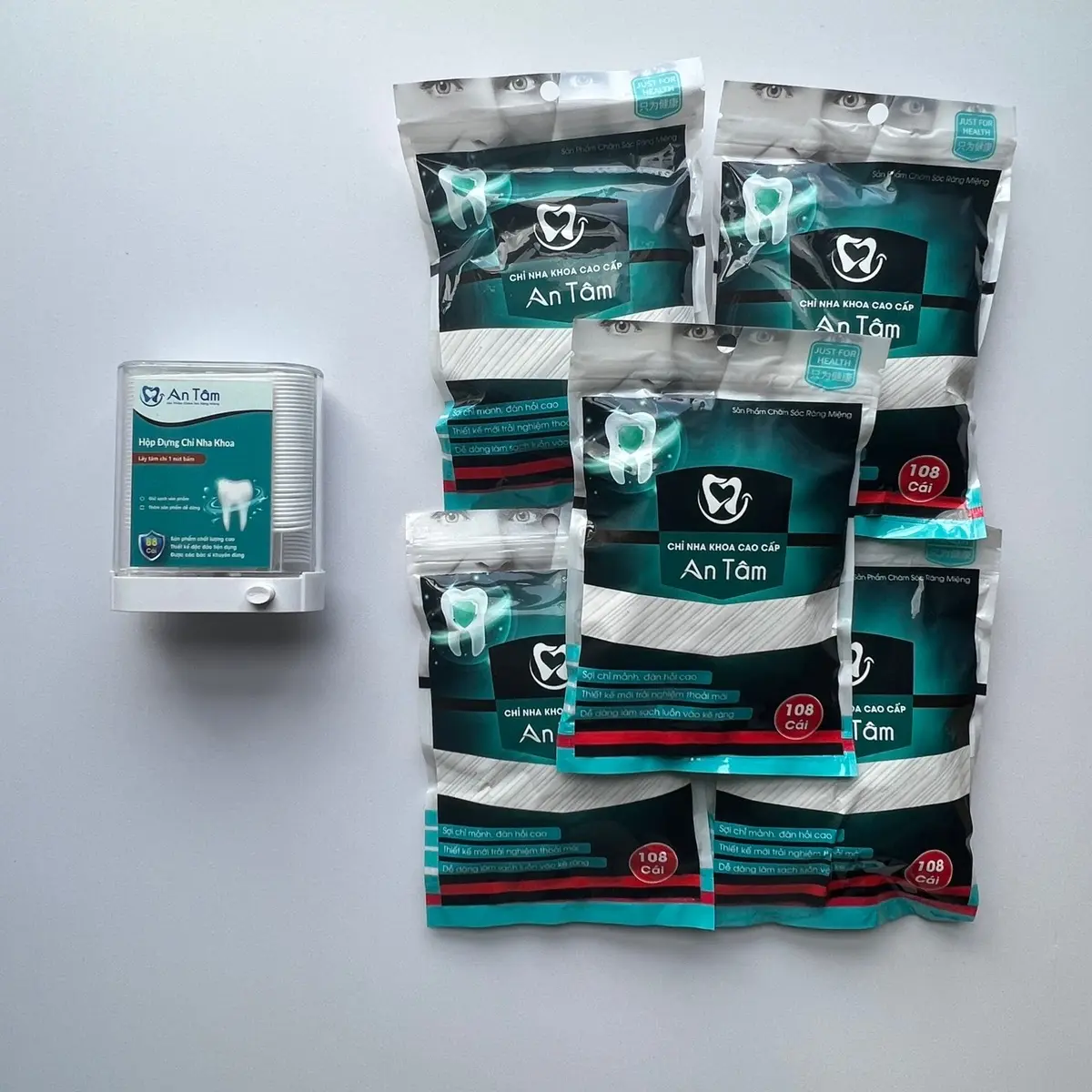 Combo tăm chỉ nha khoa 1 hộp đựng và 5 gói tăm 108 cái