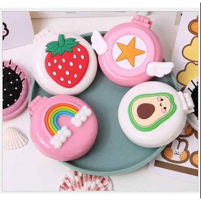 Gương lược mini có thể gấp gọn mang đi mọi nơi, lược trải đầu massage cầm tay gấp gọn phong cách cute dễ thương (giao hình ngẫu nhiên)