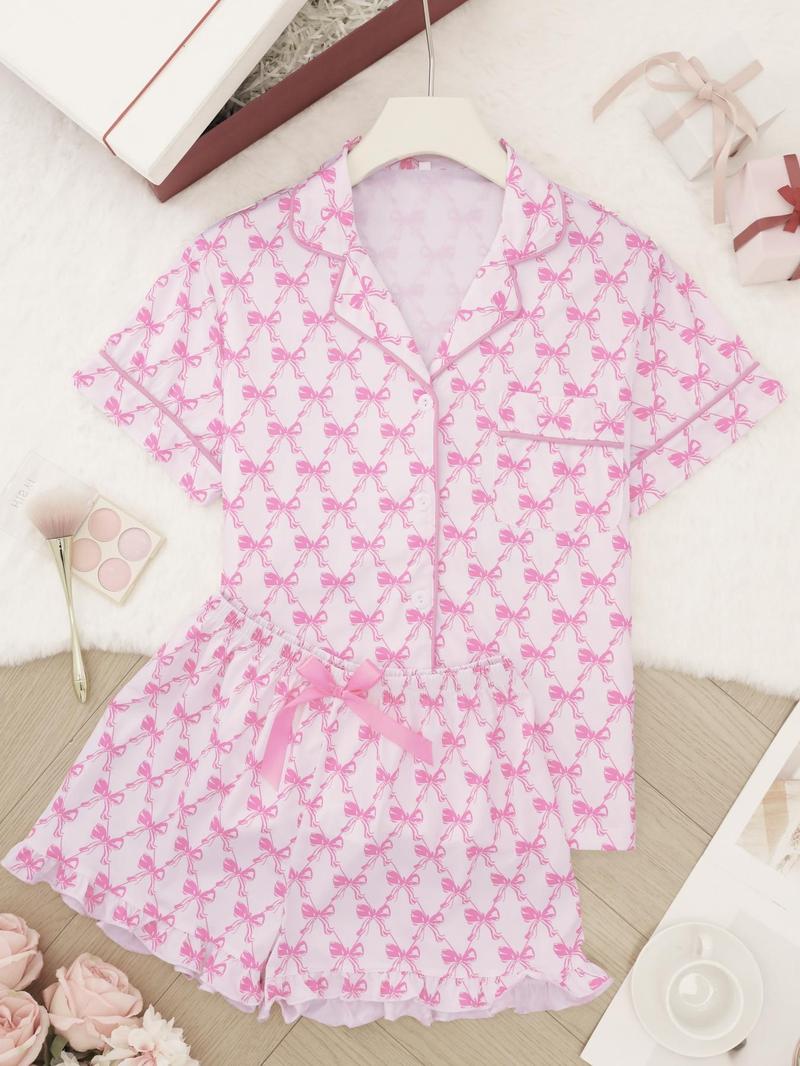 Product Introduction of Women's All Over Bow Print Short Sleeve Lapel Neck Shirt & Bow Decor Elastic Waist Shorts Pajama Two-Piece Set, Casual Comfy Button Front Chest Pocket Design Top & Ruffle Hem Shorts PJ Set, Ladies Sleepwear for Summer 1