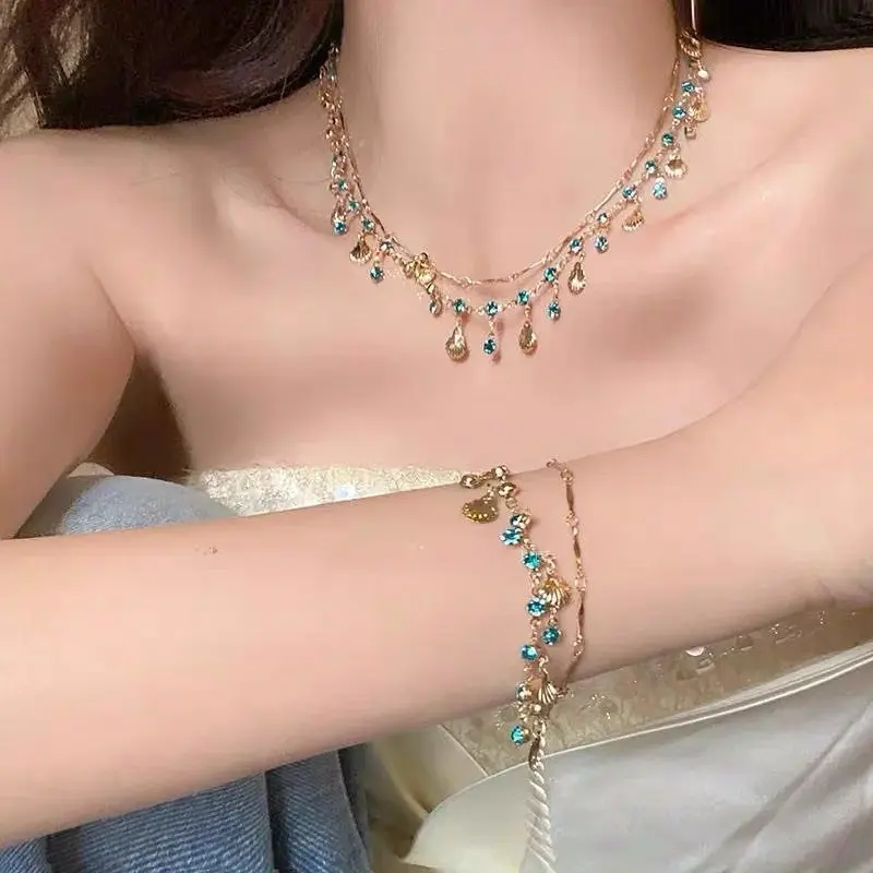 Kalung dan Gelang Terpisah Model Kerang Emas Zirkon Biru