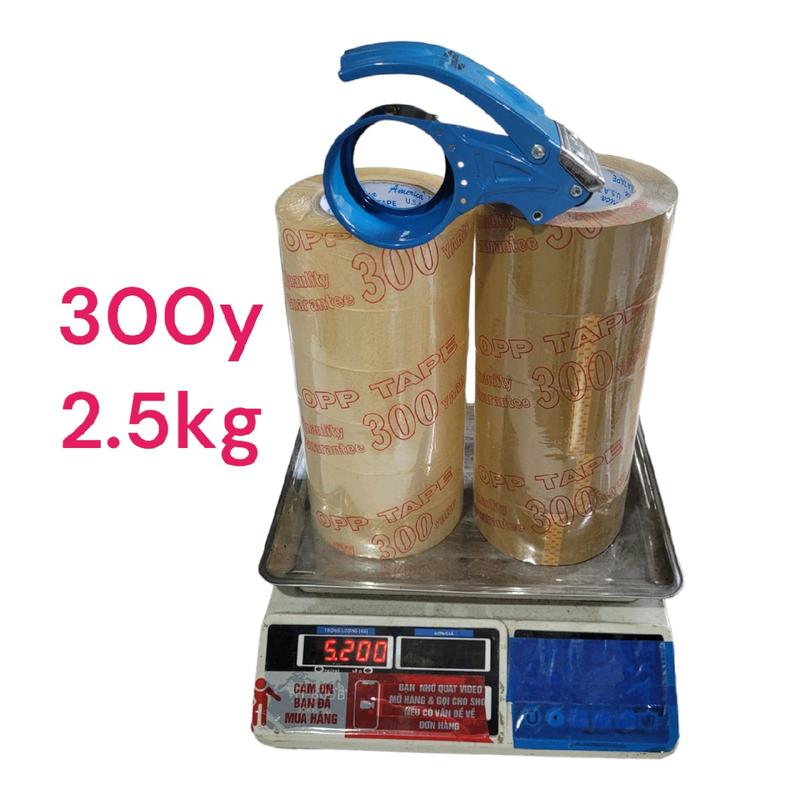 2 cây Băng Keo 300y LOẠI 2.5KG màu Trong hoặc Đục 1 cây gồm 6 cuộn và được TẶNG DAO CẮT