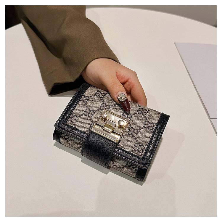 Product Introduction of Ladies' Short, High Appearance, Multi Slot, Three Fold Buckle, Hand-held Long Wallet 23