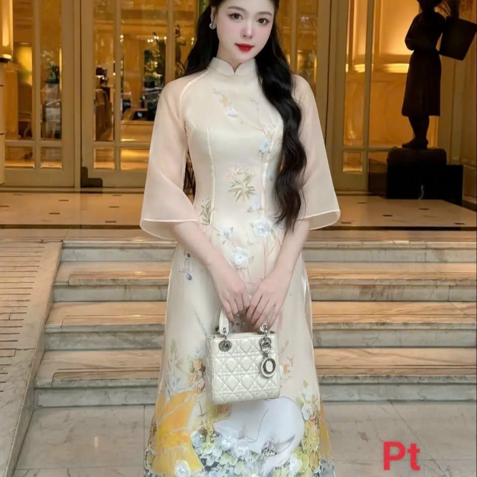 Áo dài cách tân đính kết tông màu xinh